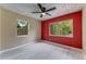Bedroom featuring wood-look ceiling and flooring, with natural light from two windows at 182 Grove St, Ormond Beach, FL 32174