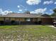 Charming single-story home featuring a well-maintained lawn and attached two-car garage at 1887 Viking Ave, Deltona, FL 32725