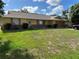 Charming single-story home featuring a well-maintained lawn and attached two-car garage at 1887 Viking Ave, Deltona, FL 32725