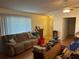 Cozy living room featuring plenty of natural light at 1887 Viking Ave, Deltona, FL 32725
