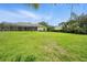 Beautiful home with expansive backyard and screened lanai and pool at 19 Tomoka Cove Way, Ormond Beach, FL 32174