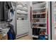 Organized walk-in closet with shelving, drawers, and hanging rods at 19 Tomoka Cove Way, Ormond Beach, FL 32174