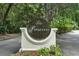 Entrance sign for The Preserve community, framed by mature trees and lush landscaping at 19 Tomoka Cove Way, Ormond Beach, FL 32174