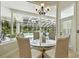 Dining area with outside access and backyard pool view at 19 Tomoka Cove Way, Ormond Beach, FL 32174
