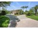 Beautiful home with circular driveway and three-car garage at 19 Tomoka Cove Way, Ormond Beach, FL 32174