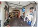A well-organized garage with a work area and storage shelves at 19 Tomoka Cove Way, Ormond Beach, FL 32174