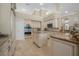 Spacious kitchen with granite countertops, stainless steel appliances, and custom cabinets at 19 Tomoka Cove Way, Ormond Beach, FL 32174