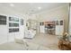 Spacious living room showcasing hardwood floors, custom built-ins, and neutral color palette at 19 Tomoka Cove Way, Ormond Beach, FL 32174