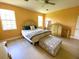 Bright bedroom with hardwood floors, a comfortable bed, and ample natural light, creating a relaxing retreat at 19320 Oberly Pkwy, Orlando, FL 32833