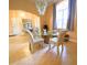 Elegant dining area featuring a glass table, stylish chairs, and an eye-catching chandelier at 19320 Oberly Pkwy, Orlando, FL 32833