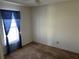 A bedroom with a window allowing for natural light to come in at 1973 S Old Mill Dr, Deltona, FL 32725
