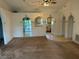Living room view with arched doorways leading into other rooms and a decorative chandelier at 1973 S Old Mill Dr, Deltona, FL 32725