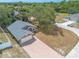 Charming single-story home featuring an attached garage, brick-paved driveway, and well-maintained landscaping at 198 Heather Lane Dr, Deltona, FL 32738