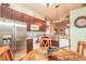 Contemporary kitchen with stainless steel appliances and a stylish breakfast nook table at 198 Heather Lane Dr, Deltona, FL 32738