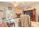 Comfortable living room with decorative ceilings fan and fireplace at 198 Heather Lane Dr, Deltona, FL 32738