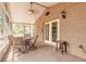Spacious screened patio with cozy seating, creating a serene outdoor space at 198 Heather Lane Dr, Deltona, FL 32738