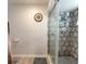 Updated walk-in shower featuring mosaic tilework and a modern showerhead at 198 Heather Lane Dr, Deltona, FL 32738