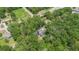 Secluded property nestled among mature trees, offering privacy and natural beauty at 2 E Kelly Park Rd, Apopka, FL 32712