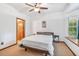 Bedroom with natural light with an ensuite bathroom and closet at 2 E Kelly Park Rd, Apopka, FL 32712