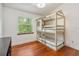 Fun bedroom with bunk beds and a window, making it a perfect space for and a playful atmosphere at 2 E Kelly Park Rd, Apopka, FL 32712