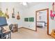 Bedroom with desk space and view of another bedroom at 2 E Kelly Park Rd, Apopka, FL 32712