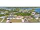 An aerial view shows the home's proximity to serene lakes and its place within the established neighborhood at 2080 Roseway Ave, Deltona, FL 32738