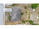 Bird's eye view of the home, revealing its roof design and property boundaries, set in a quiet neighborhood at 2234 N Normandy Blvd, Deltona, FL 32725