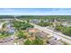 Panoramic aerial view of the neighborhood with lush greenery, showcasing the property's advantageous location at 2234 N Normandy Blvd, Deltona, FL 32725