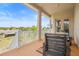 Covered porch with a scenic view, providing a relaxing spot to enjoy the outdoors and neighborhood views at 2234 N Normandy Blvd, Deltona, FL 32725