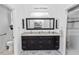 Bathroom featuring double vanity with granite countertop, decorative tile flooring, and glass-enclosed shower at 232 River Village Dr, Debary, FL 32713