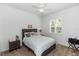 Bedroom with neutral decor and shuttered window at 232 River Village Dr, Debary, FL 32713
