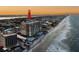 Aerial view of condo with beach access and a community pool at 2403 S Atlantic Ave # 410, Daytona Beach, FL 32118