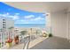 Relaxing balcony with patio furniture, offering breathtaking views of the ocean and beach, perfect for outdoor enjoyment at 2403 S Atlantic Ave # 410, Daytona Beach, FL 32118
