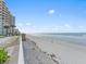 Condo beachfront access to a white sand beach with a clear ocean view at 2403 S Atlantic Ave # 410, Daytona Beach, FL 32118