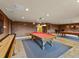 Community game room with pool tables and shuffleboard at 2403 S Atlantic Ave # 410, Daytona Beach, FL 32118