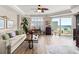 Inviting living room with stylish furnishings, hardwood floors, and a glimpse of the ocean view through the balcony doors at 2403 S Atlantic Ave # 410, Daytona Beach, FL 32118