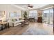 Charming living room featuring a comfortable sofa, elegant décor, and a captivating view of the ocean from the balcony at 2403 S Atlantic Ave # 410, Daytona Beach, FL 32118