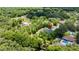 The home is nestled in a neighborhood, surrounded by lush greenery and trees at 2455 Whooping Crane Dr, De Leon Springs, FL 32130