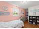 Bright bedroom with decorative accents and ample storage at 2455 Whooping Crane Dr, De Leon Springs, FL 32130