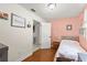 Cozy bedroom featuring a twin bed and charming decor at 2455 Whooping Crane Dr, De Leon Springs, FL 32130