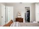 View of the main bedroom showing the en suite bathroom and walk-in closet at 2455 Whooping Crane Dr, De Leon Springs, FL 32130