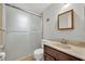 Bathroom featuring a glass door shower and a vanity sink at 2468 Kimberly Dr, Deltona, FL 32738
