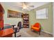 Bedroom with carpet flooring, ceiling fan, and desk at 2468 Kimberly Dr, Deltona, FL 32738