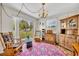 Inviting living room with a view of the backyard and patio at 2468 Kimberly Dr, Deltona, FL 32738