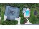 A great overhead view of the backyard pool, gazebo, landscaping, and unique home architecture at 2480 S Glen Eagles Dr, Deland, FL 32724