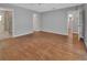 Spacious bedroom boasts wood-look floors and ample natural light at 2480 S Glen Eagles Dr, Deland, FL 32724