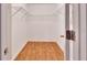 Walk-in closet boasts ample storage with installed shelving at 2480 S Glen Eagles Dr, Deland, FL 32724