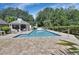 Enjoy the sparkling in-ground pool and lovely gazebo in this private outdoor space at 2480 S Glen Eagles Dr, Deland, FL 32724
