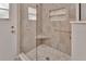 Stylish walk-in shower with glass door and built-in shelving at 2480 S Glen Eagles Dr, Deland, FL 32724
