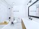 Modern bathroom with black fixtures, a tub, and a sleek vanity at 2526 Victory Palm Dr, Edgewater, FL 32141
